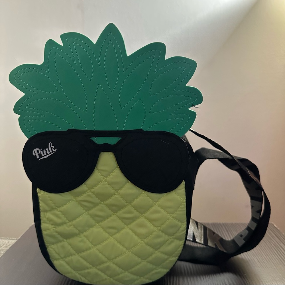 Pink brand personal cooler bag. pineapple theme